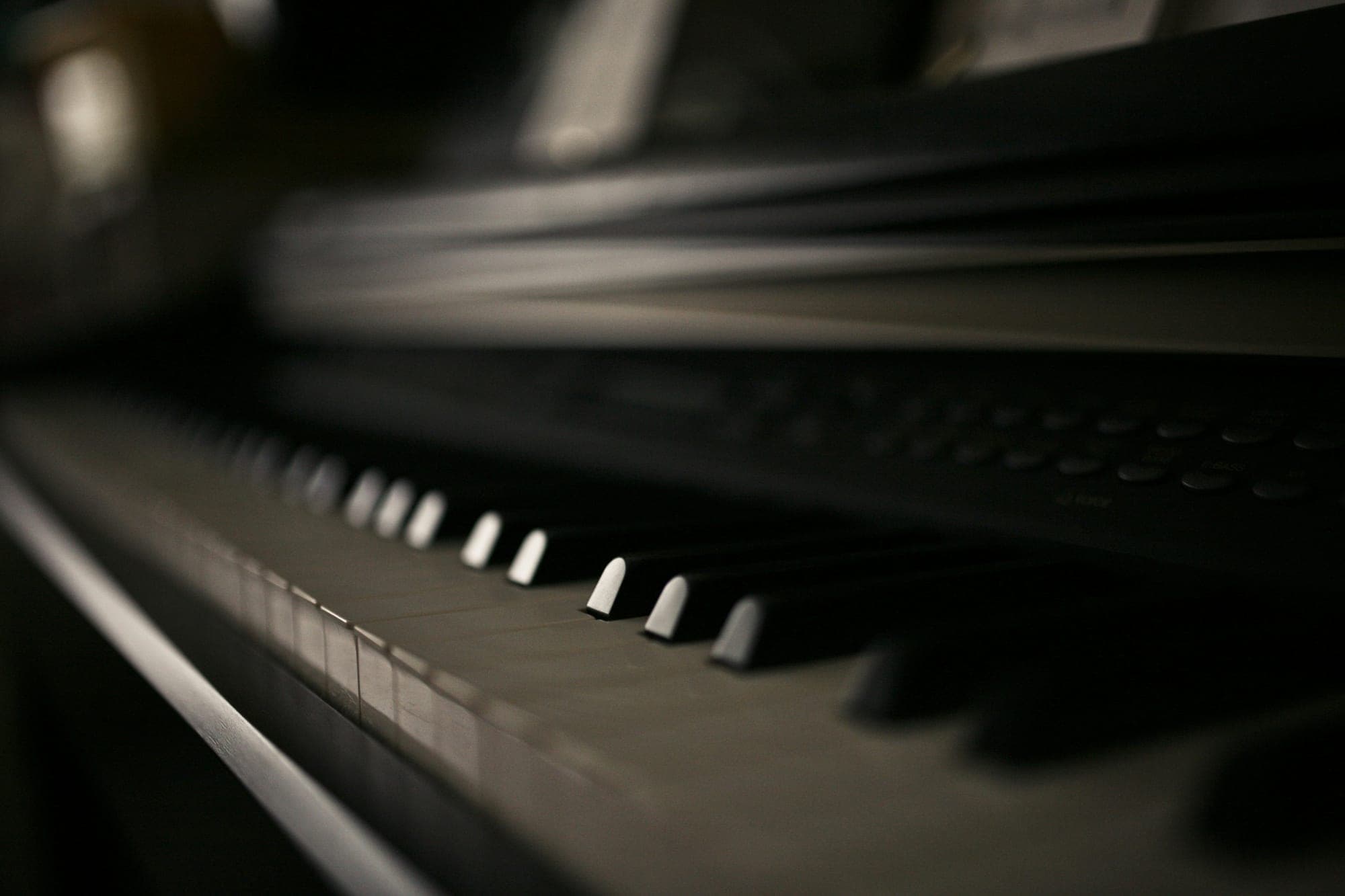 Piano keys, softly lit